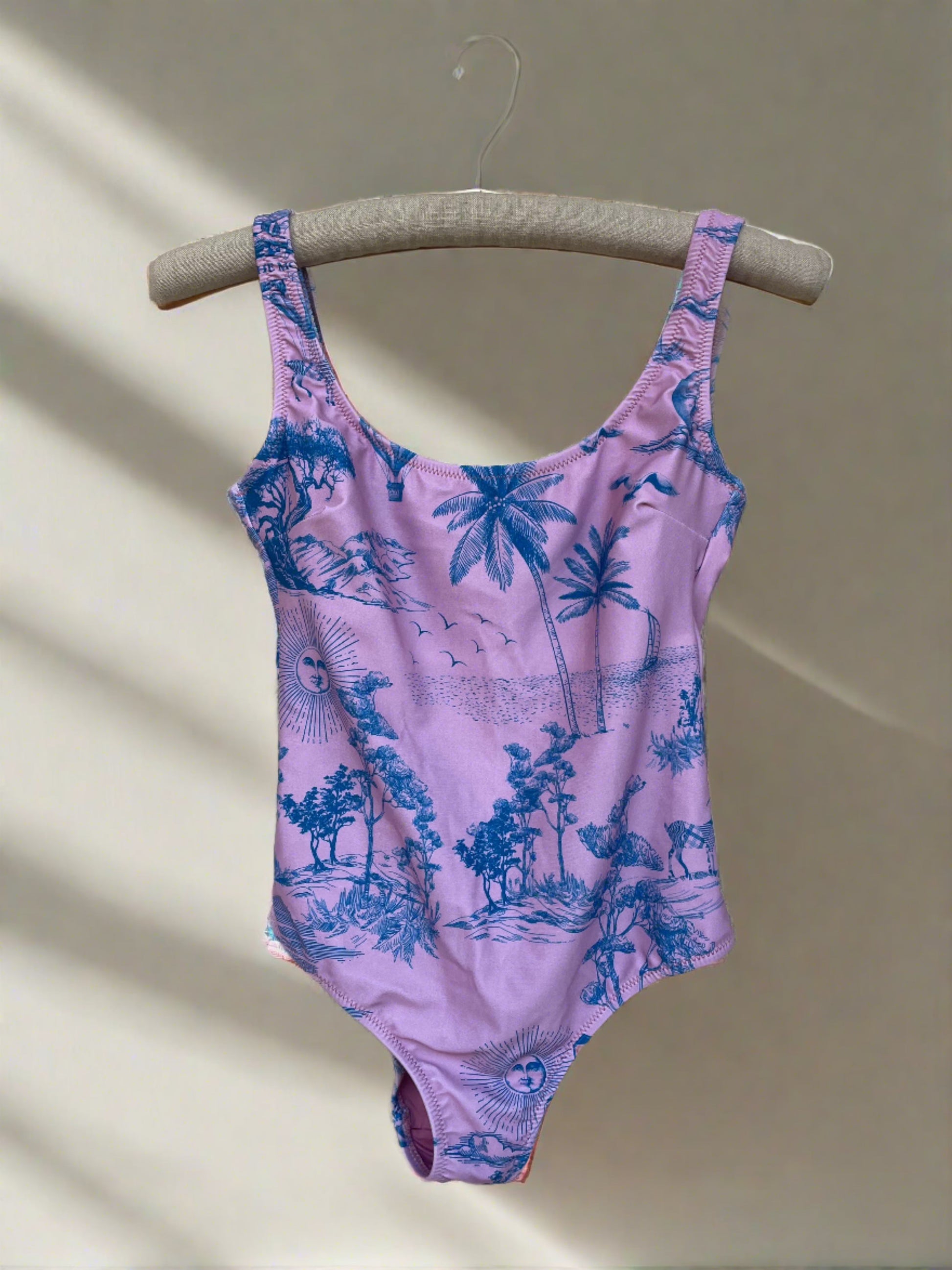 printed swimsuit on hanger