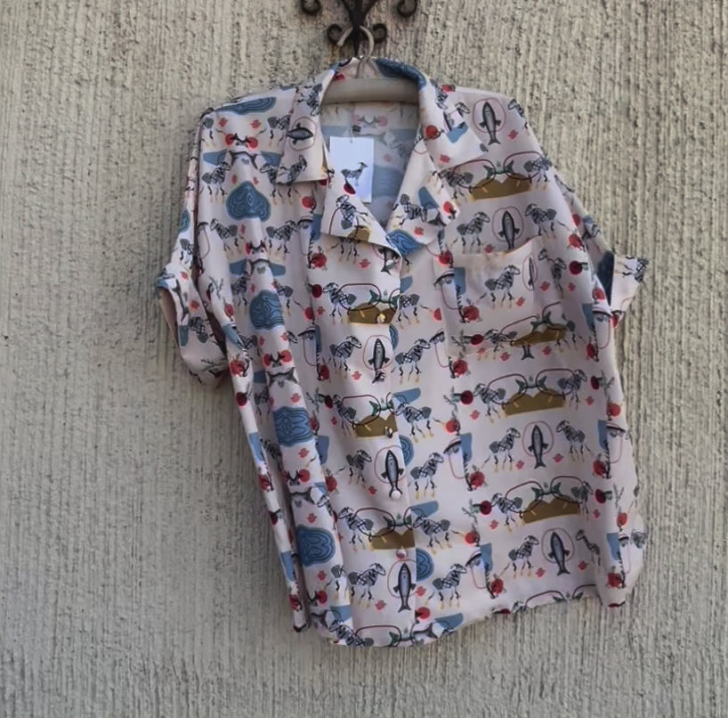 printed shirt on a hanger moved by air